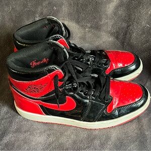 Air Jordan 1 Retro High OG 'Patent Bred' sneaker.